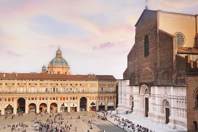 Bologna historical art walking tour with hidden gems and tastings - Palazzo d’Accursio: frescoed rooms, a bishop’s chapel, and Bramante’s horsemen stairs